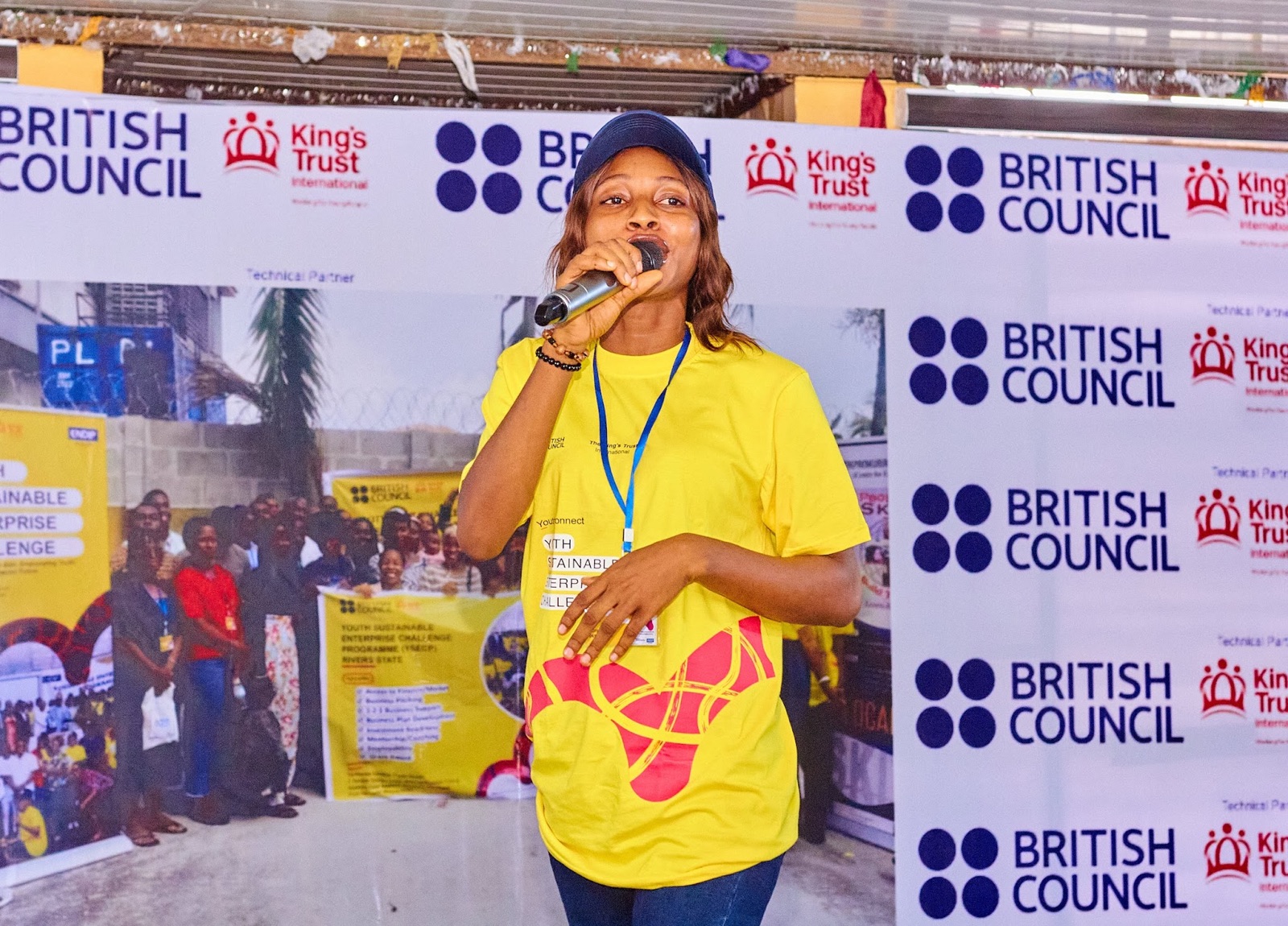 A young entrepreneur presenting her business idea to a panel